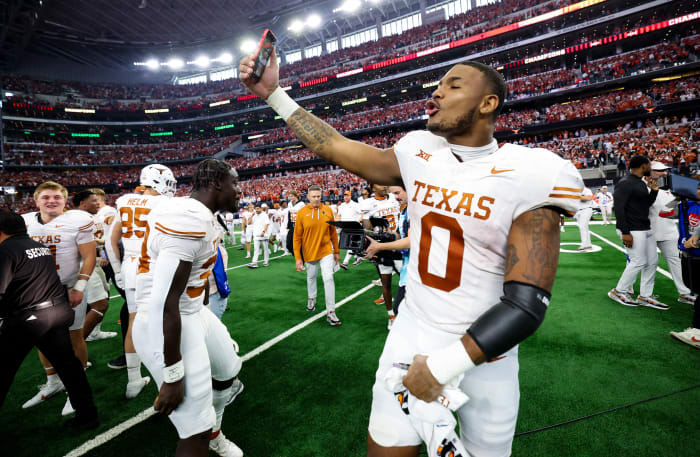 Texas Longhorns TE Ja'Tavion Sanders celebrates winning the Big 12 Conference championship at AT&T Stadium in Arlington, Texas